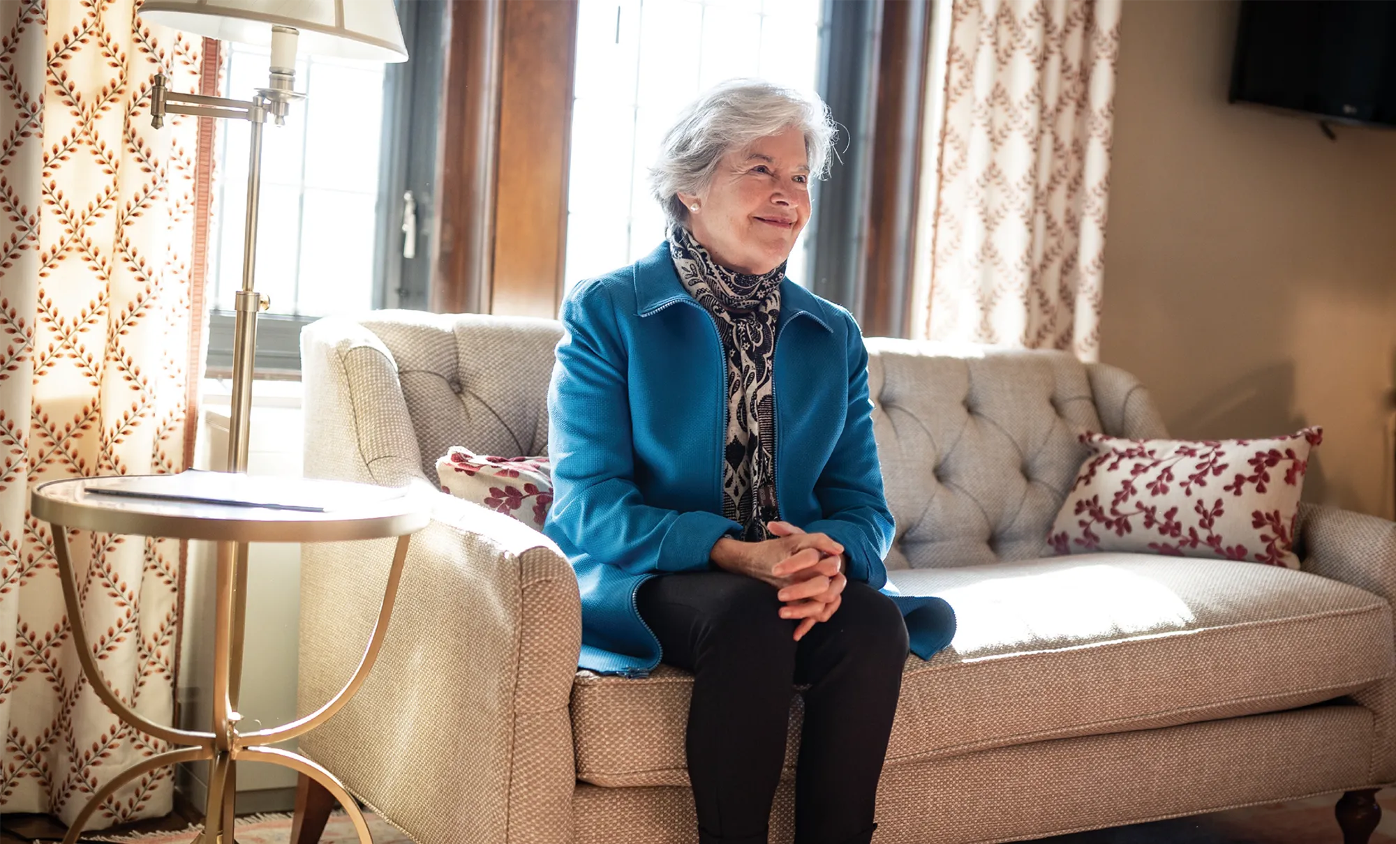 Sally Dayton Clement ’71, P’09 sits in one of the rooms renovated thanks to a joint donation by her and her sister