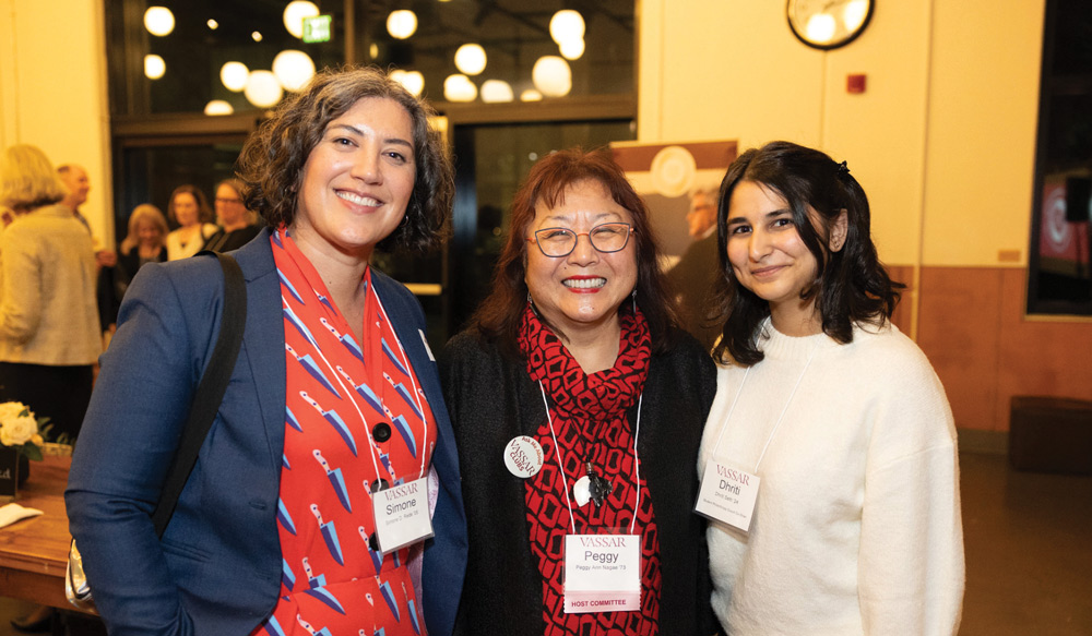Another co-host, Peggy Ann Nagae ’73 poses with Simone Rede ’05 and Dhriti Seth ’24.
