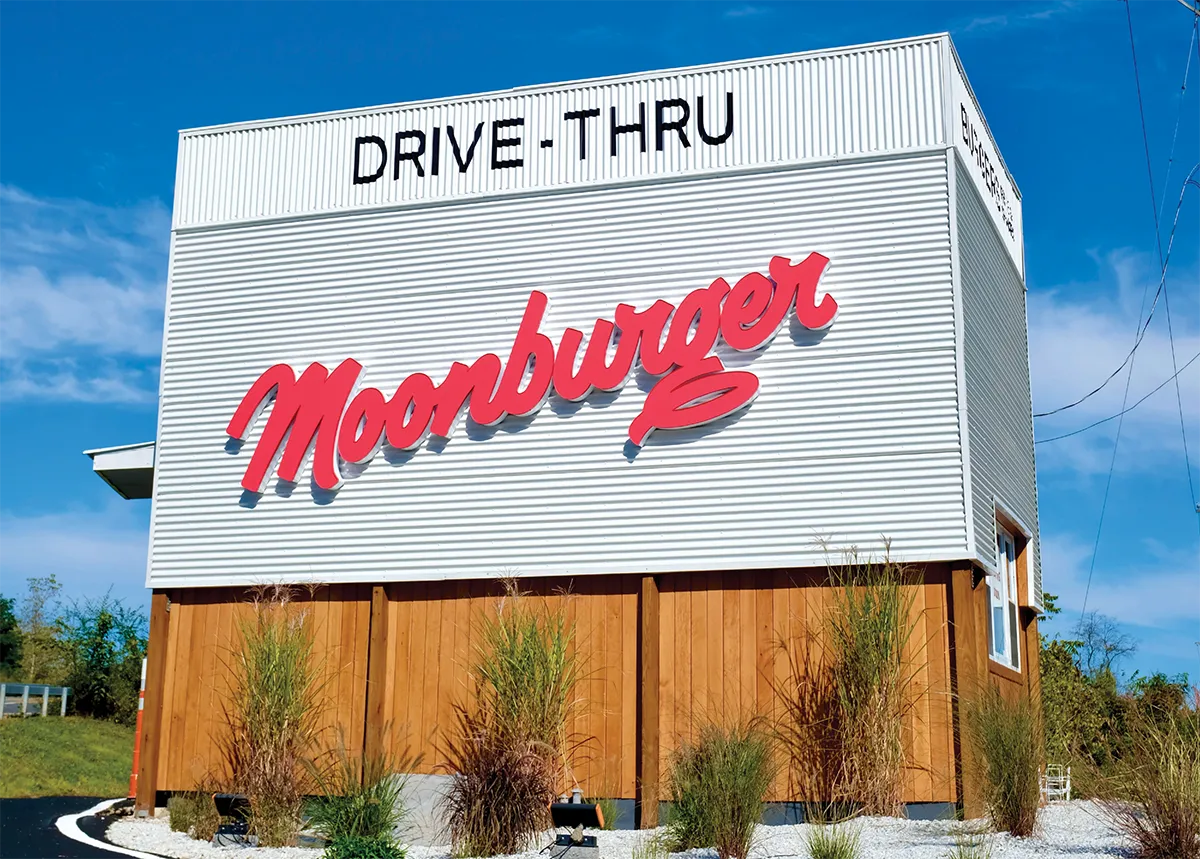 Photo of Moonburger’s first location in Kingston, NY; a small retro-looking drive through spot.