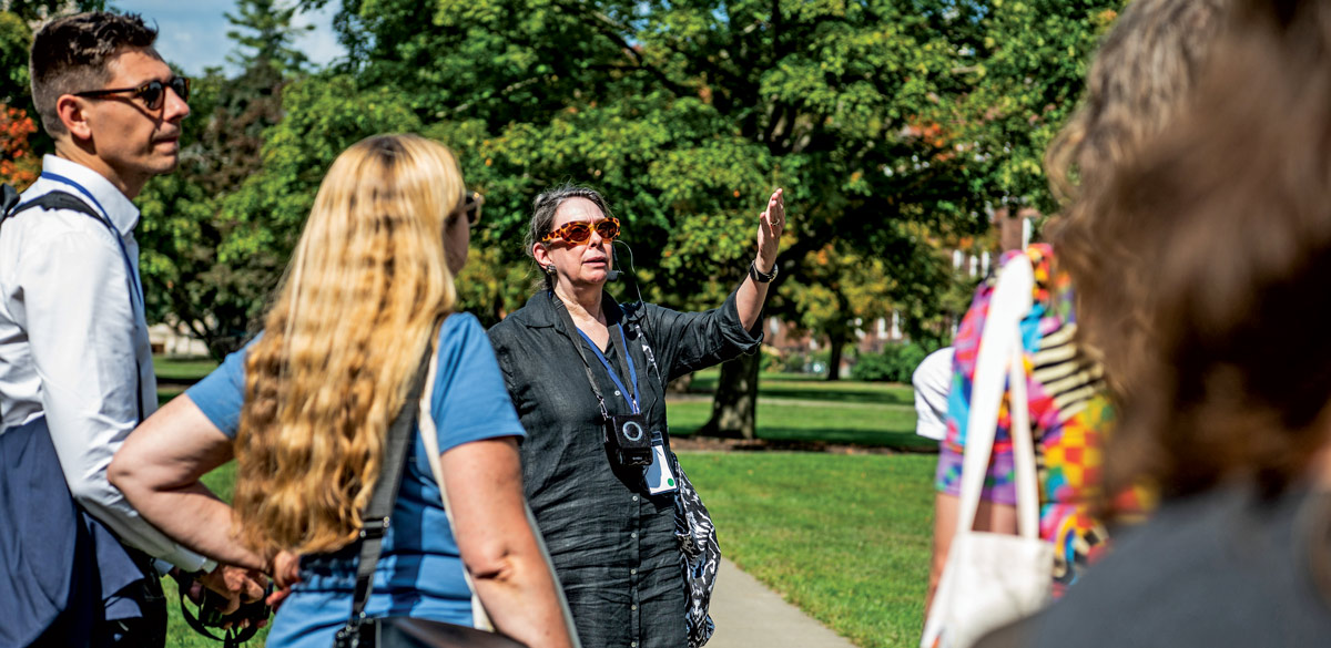 Professor Yvonne Elet leads a group tour of the Vassar campus. 