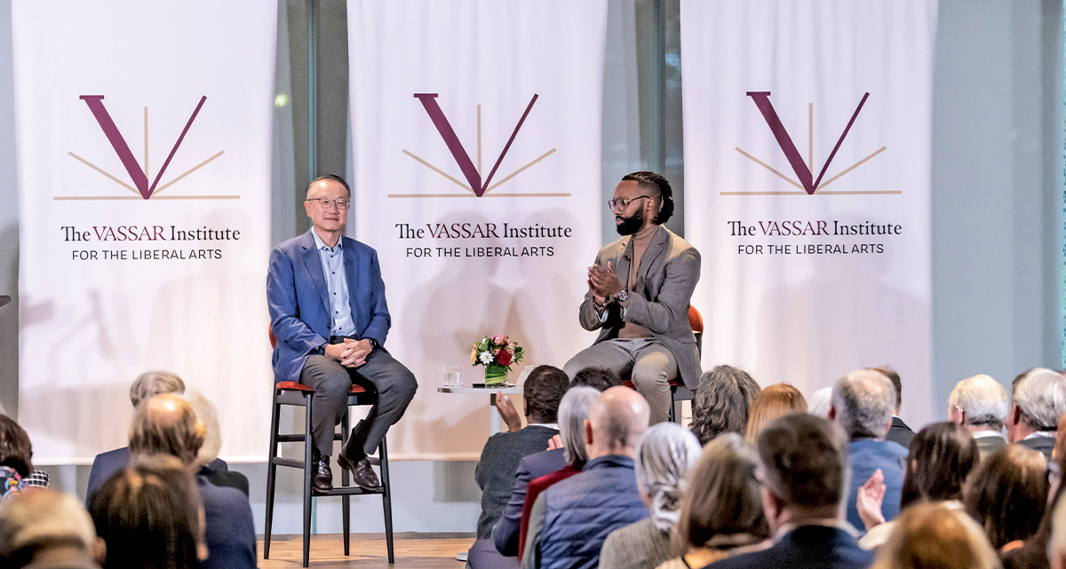 Jim Yong Kim, Chancellor of the University of Global Health Equity, on stage with Wesley Dixon.