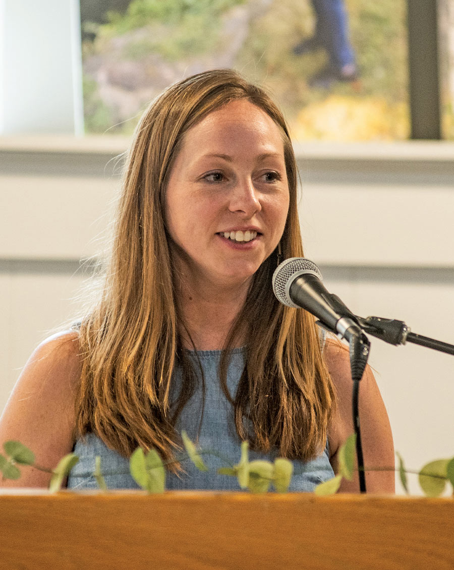 Elizabeth Cannon, Director the Office of Community-Engaged Learning, addresses an audience.