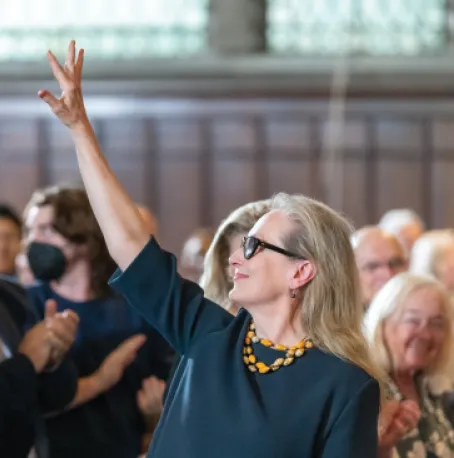 Meryl Streep ’71, P ’08,’13 waves to crowd while receiving the Distinguished Achievement Award.