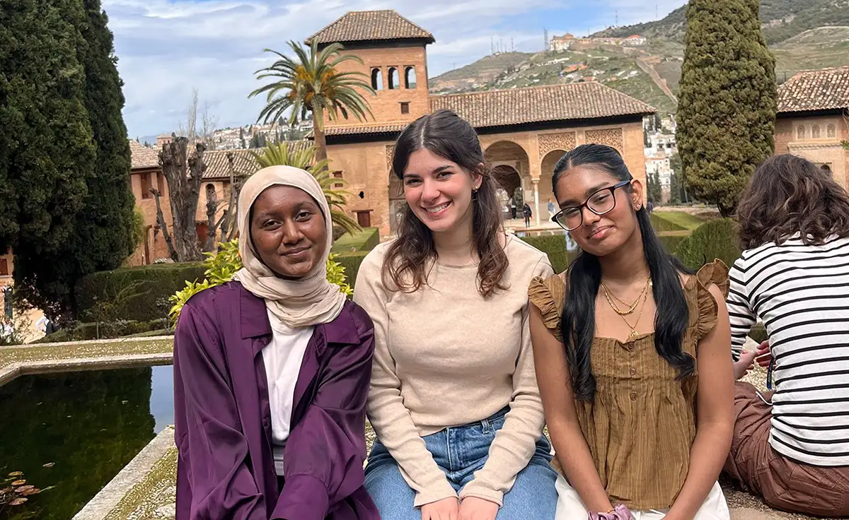 Portrait of three students in Spain.
