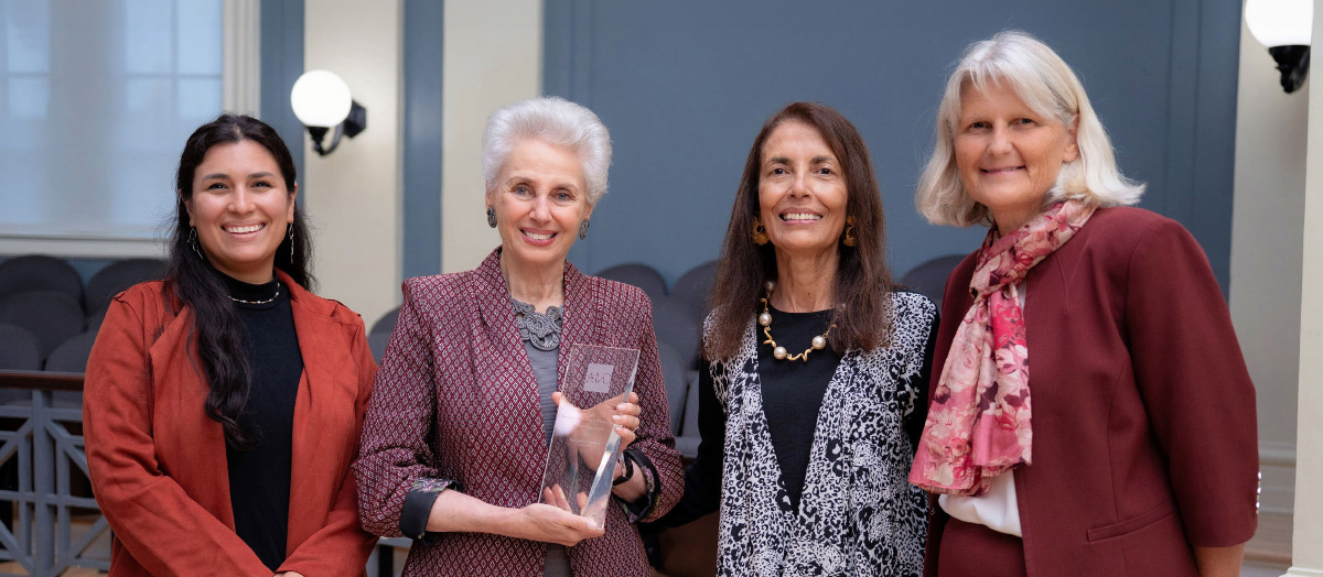 Georgette Bennett ’67 accepting the Spirit of Vassar Award from the AAVC Alum Recognition Committee Vice Chair Stephanie Goldberg ’14, AAVC President Monica Vachher ’77, and President Elizabeth Bradley.
