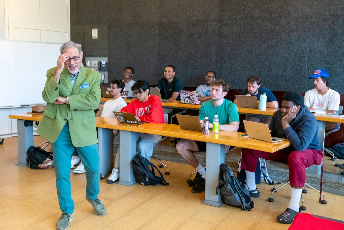 Professor Marc Michael Epstein, Director of Jewish Studies, laughing with students as he teaches.