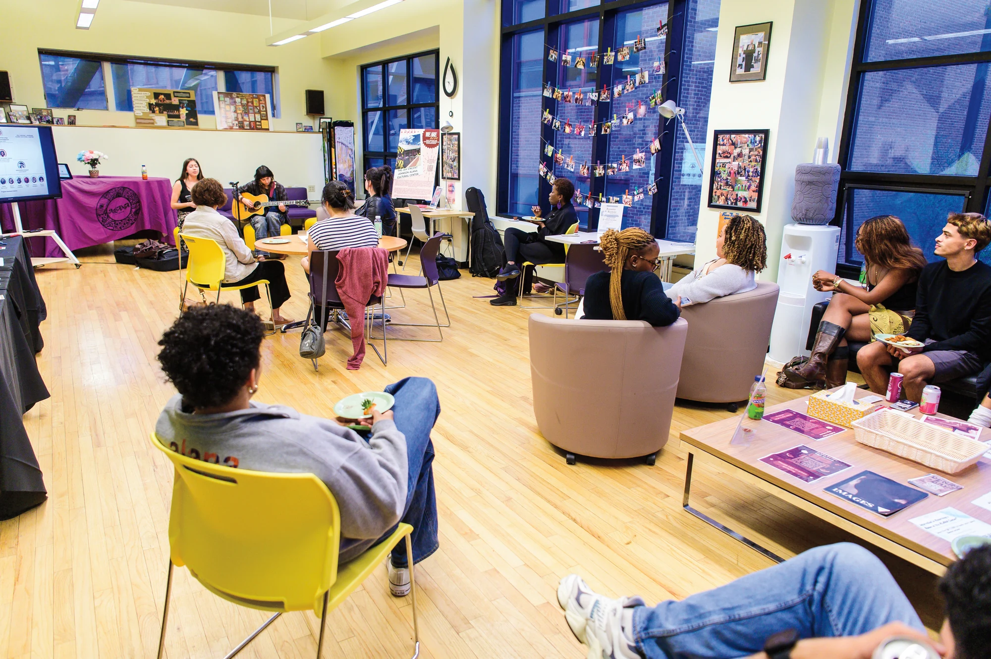 Students gather in a lounge for a group discussion at Vassar.