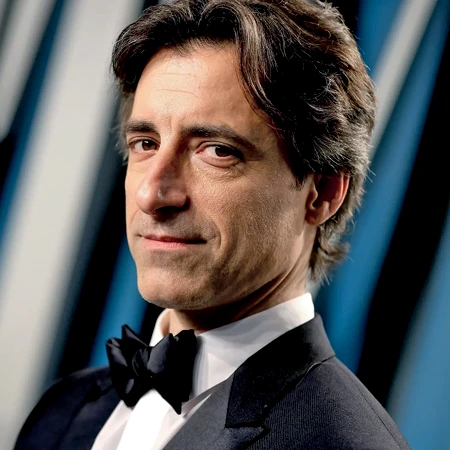 Noah Baumbach poses in a black tuxedo and bow tie.