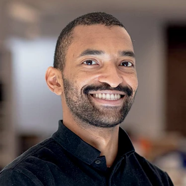 Gabriel Ramos smiles in a professional headshot.